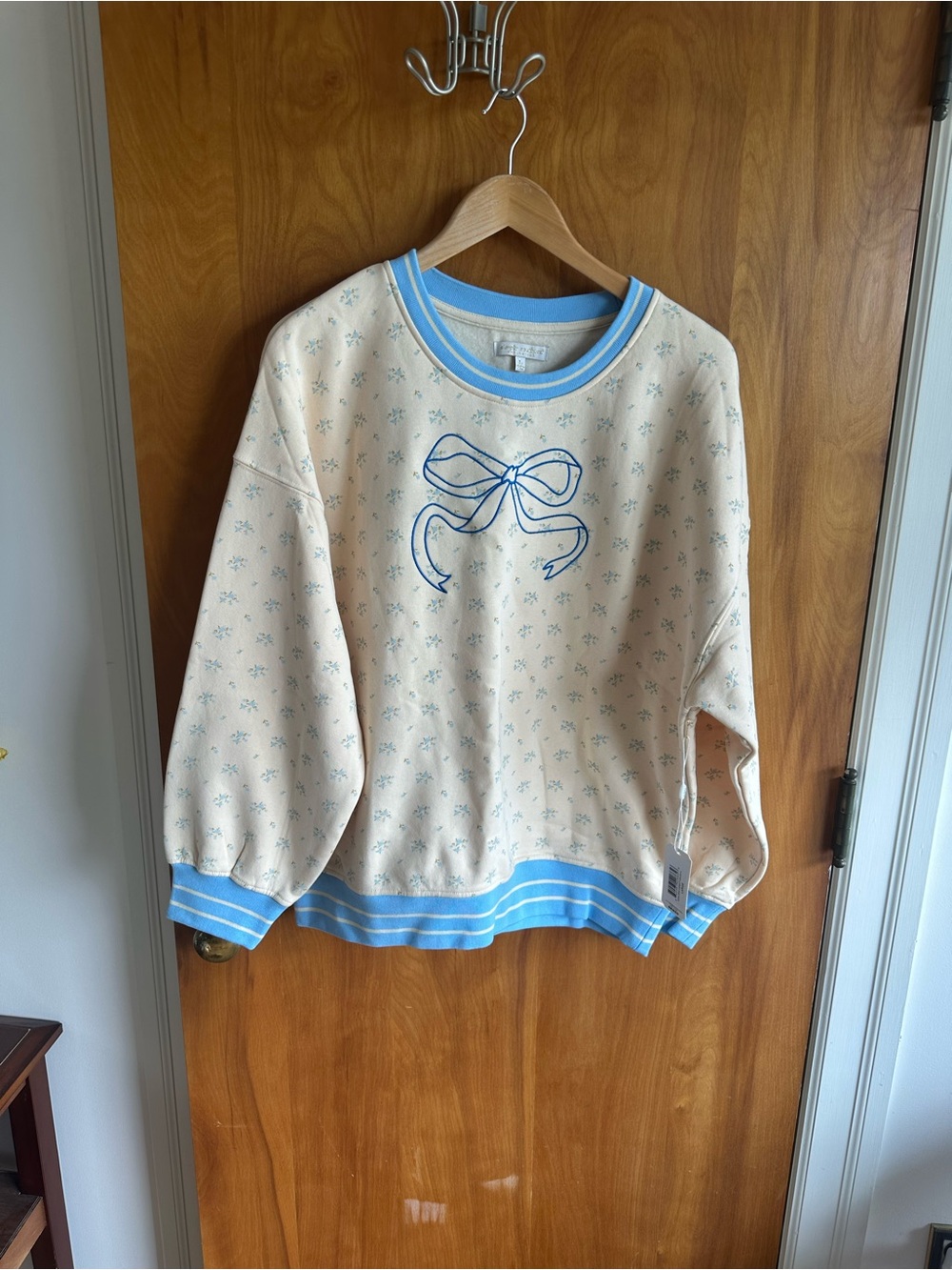 Simply Southern Cream Sweatshirt with Light Blue Bow and Trimmed Accents